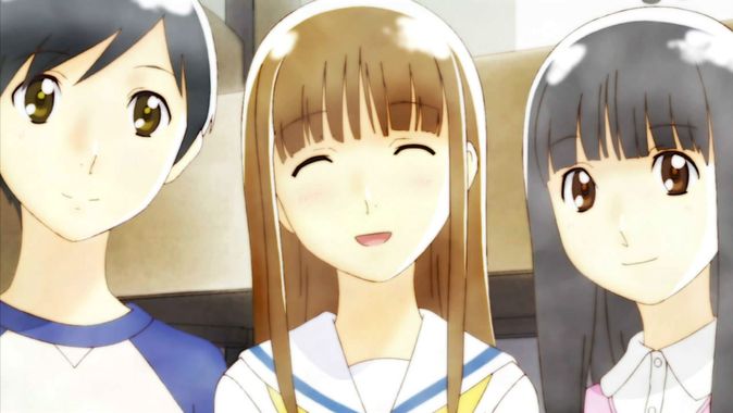 Screenshot dall'anime di Wandering Son con la protagonista e due suoi amici che posano per una foto.